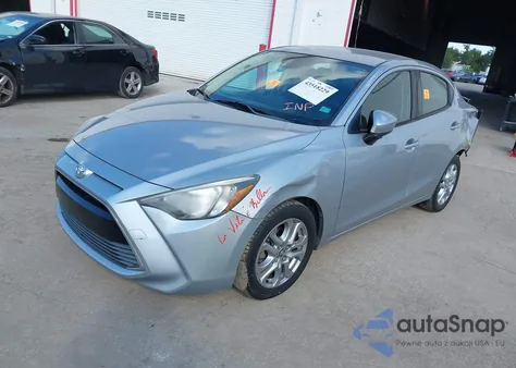 2018 Toyota Yaris Ia из США, поврежденный, VIN 3MYDLBYV6JY310490